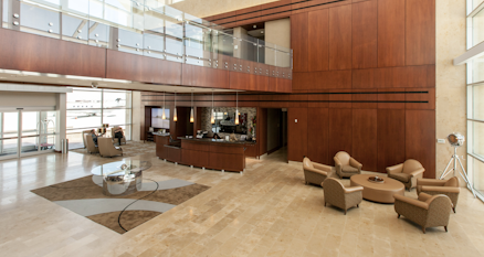 What is an airport FBO and how do I check-in for a private jet flight?